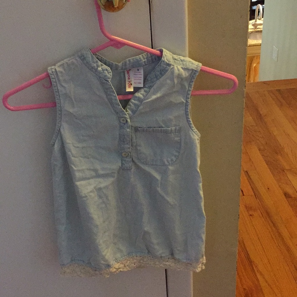 A blue soft, lacy denim tank top.